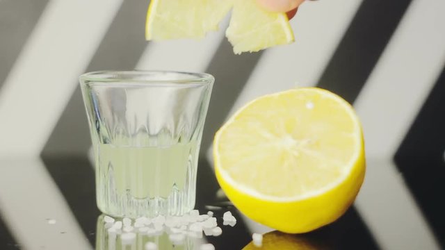 Barman Put On Slice Of Lemon On The Edge Of Glass With Alco Drink