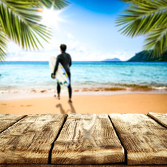 Desk of free space and summer beach background 