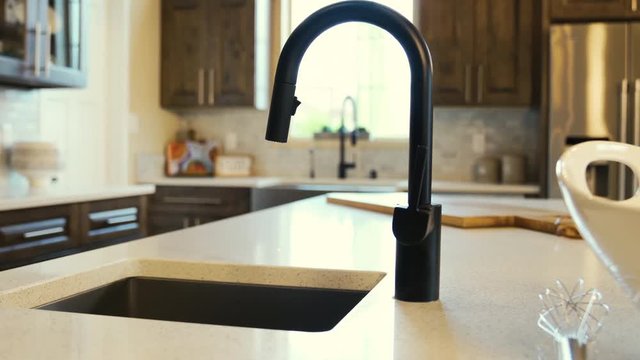 Kitchen Island Faucet Profile Move Left. view moves left on a detail profile of kitchen island faucet and sink