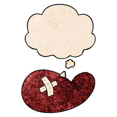 cartoon injured gall bladder and thought bubble in grunge texture pattern style