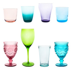 Set of different multicolored empty glasses on white background
