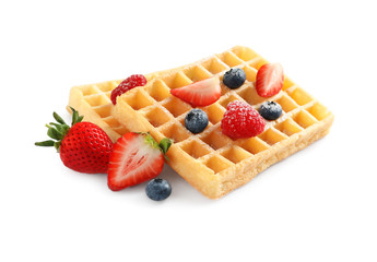 Yummy waffles with berries on white background