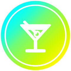 cocktail with olive circular in cold gradient spectrum