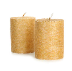 Stylish elegant gold candles on white background. Decor element