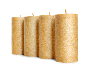 Stylish elegant gold candles on white background. Decor element
