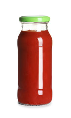 Delicious tomato sauce in glass bottle on white background