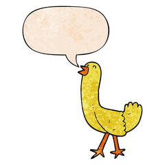 cartoon bird and speech bubble in retro texture style