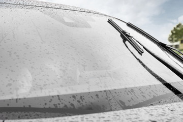 Closeup view of car window on rainy day, closeup
