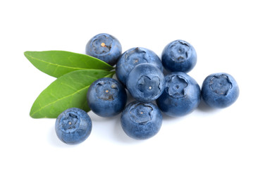 Fresh raw tasty blueberries with leaves isolated on white