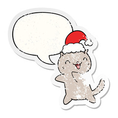 cute cartoon christmas cat and speech bubble distressed sticker