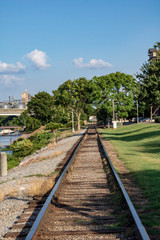 Fototapeta na wymiar Railroad tracks alongside the Tennessee River