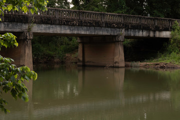Fototapeta na wymiar An Old bridge over a the Flint River in North Alabama