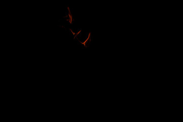 Red flames on black background taking photo with natural light environment taken with tripod in  Mexico at night