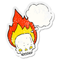spooky cartoon flaming skull and thought bubble as a distressed worn sticker