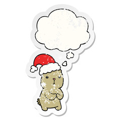 cartoon christmas bear worrying and thought bubble as a distressed worn sticker