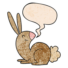 cute cartoon rabbit and speech bubble in retro texture style