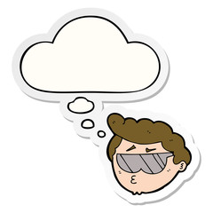 cartoon boy wearing sunglasses and thought bubble as a printed sticker