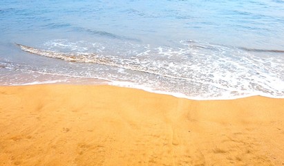 Waves on a Sandy Bright Beach 
