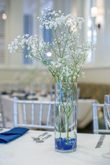 Babys breath flowers in glass vase centerpiece