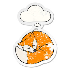cartoon sleeping fox and thought bubble as a distressed worn sticker