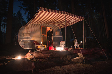 vintage camper trailer at night