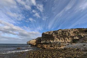 Sandstone guards at the coastline of Arniston
