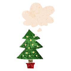 cartoon christmas tree and thought bubble in retro textured style