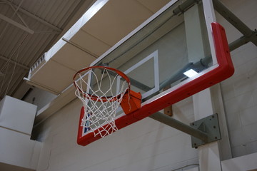 Looking up at the basketball net
