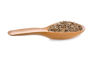 caraway seeds in wood spoon on white background
