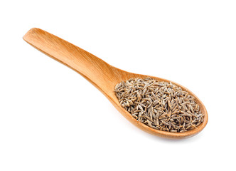 caraway seeds in wood spoon on white background