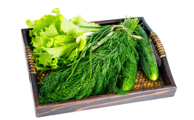 Wooden tray with fresh bio vegetables. Photo