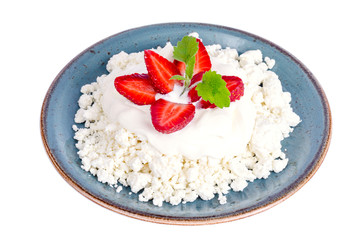 Fresh granulated cottage cheese with strawberries. Photo