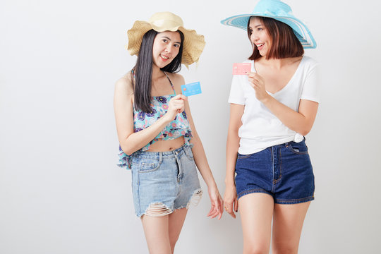 portrait of two hipster girls white background