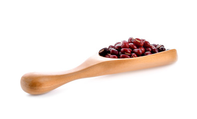 Red bean seeds In wood scoop on white background