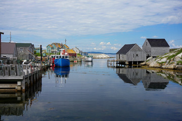 Fototapeta na wymiar Boats moored in Peggy's Cove, Nova Scotia