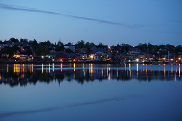 Fototapeta premium Lights of Lunenburg, Nova Scotia waterfront in the evening