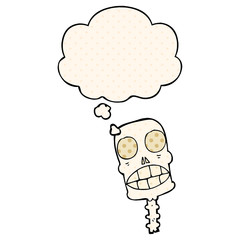 cartoon spooky skull and thought bubble in comic book style