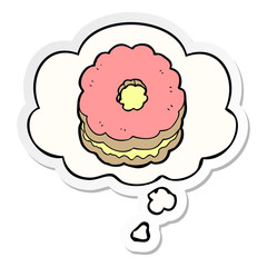 cartoon biscuit and thought bubble as a printed sticker