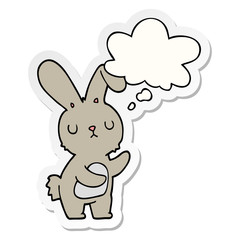 Obraz na płótnie Canvas cute cartoon rabbit and thought bubble as a printed sticker