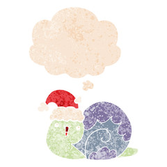 cute cartoon christmas snail and thought bubble in retro textured style