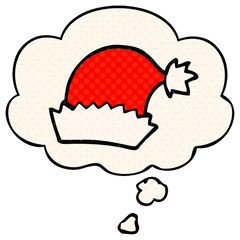 cartoon christmas hat and thought bubble in comic book style