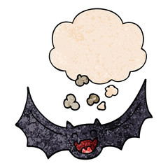 cartoon bat and thought bubble in grunge texture pattern style