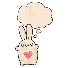 Obraz premium cute cartoon rabbit with love heart and thought bubble in grunge texture pattern style
