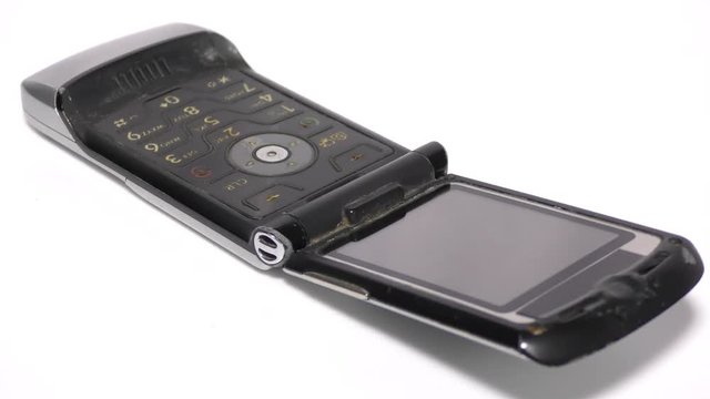 The old style mobile phone with flip keypad