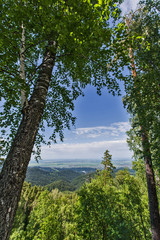 Obraz premium summer landscape with mountains and clouds