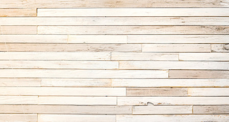 Reclaimed wood surface with aged boards lined up. Wooden planks on a wall or floor vintage wood background.