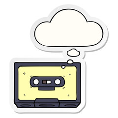 cartoon old cassette tape and thought bubble as a printed sticker