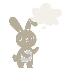 cute cartoon rabbit and thought bubble in retro style