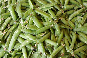 Close up full frame view of snow peas displayed for sale at a market stand