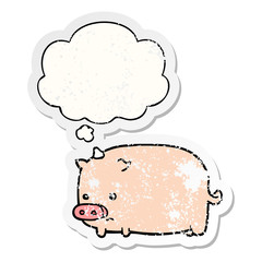 cute cartoon pig and thought bubble as a distressed worn sticker